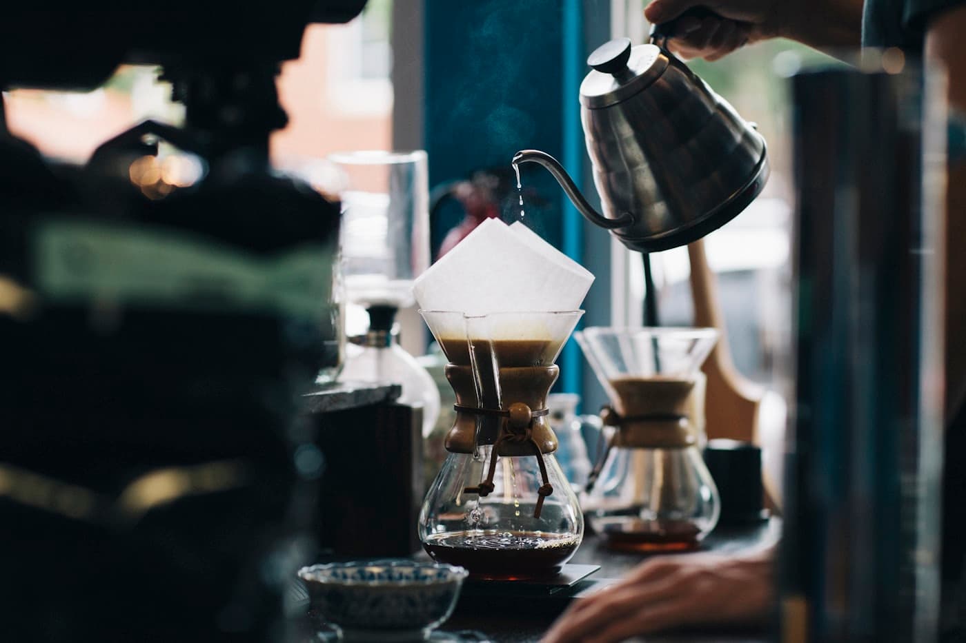 Latte and notebook on a wooden table